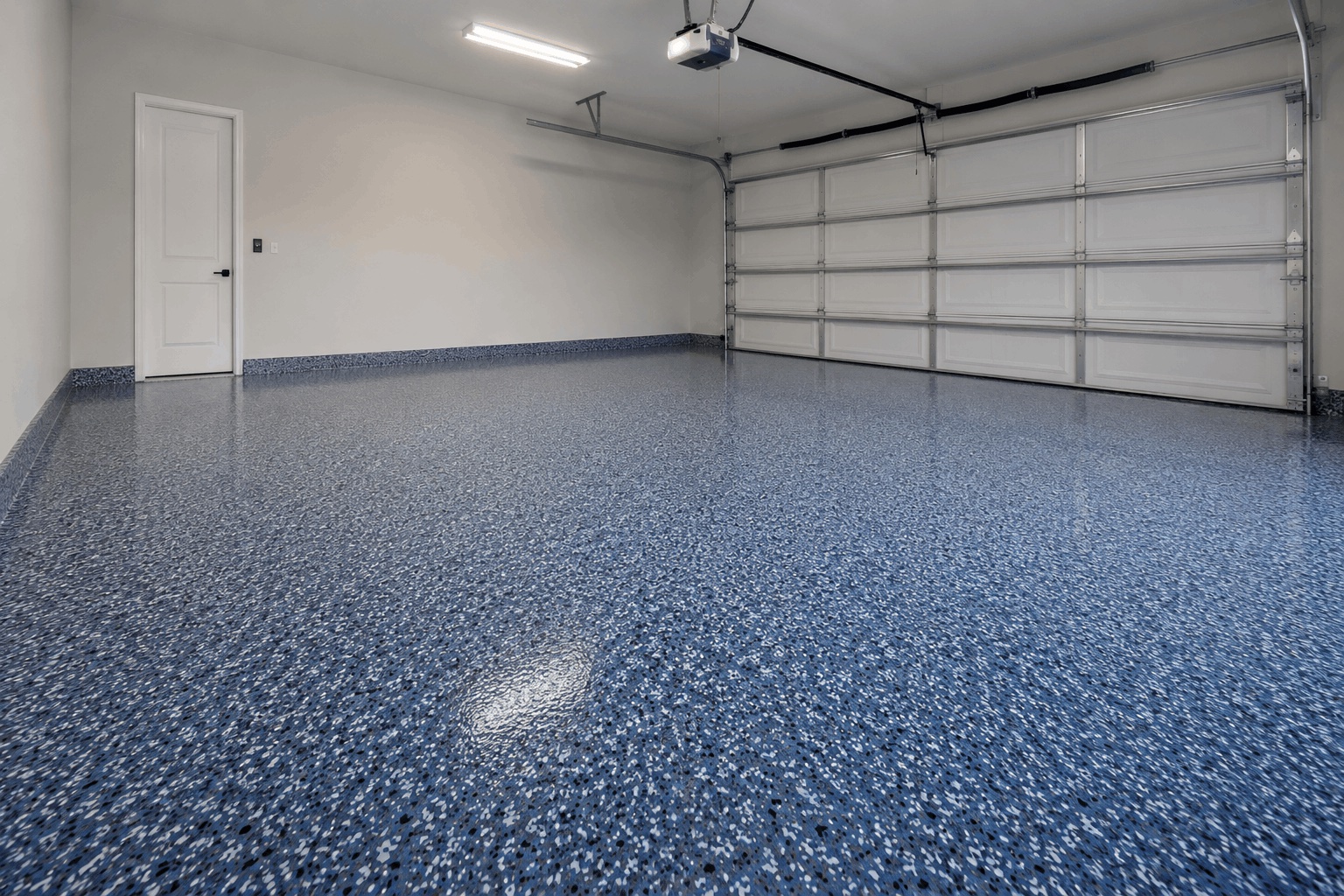Two-car garage with a glossy blue flake floor coating